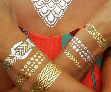 Accent your outfit like any self respecting Coachella attendee would with these gold and silver temporary tattoos. These nontoxic tattoos shimmer in brilliant metallic hues and are waterproof - making them ideal for anything from beach outings to music festivals. Gold Tattoo Ink, Gold Temporary Tattoo, Gold Henna, Silver Tattoo, Metallic Tattoo Temporary, Gold Tattoo, Metal Tattoo, Formal Jewelry, Tattoo Bracelet