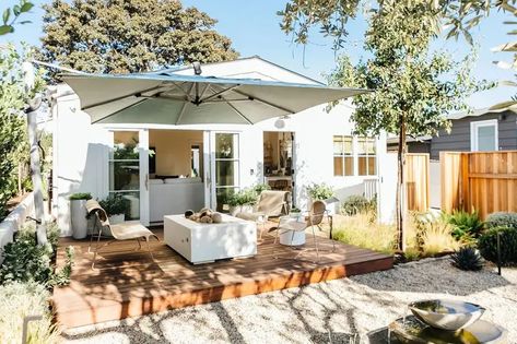 How People Are Really Using Their Front Yards in 2024 | domino Front Yard Lounge Area, Sunroom Transformation, Front Yard Deck, Entry Courtyard, Ipe Wood Deck, House Flipper, Front Yard Patio, Yard Makeover, California Backyard