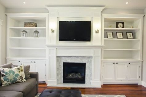 Built-in fireplace surround, elevated crown. no tv.  I like the tile around the fireplace Tv Above The Fireplace, Built In Around Fireplace, Diy Fireplace Mantel, Above The Fireplace, Casa Clean, Housing Ideas, Family Room Makeover, Fireplace Built Ins, Flat Screen Tv