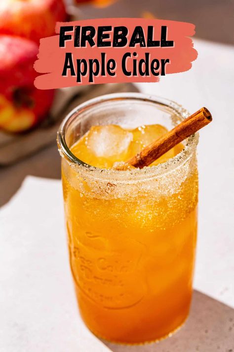 This Fireball Apple Cider is the perfect fall cocktail! Easy to make, super tasty and with the perfect apple cinnamon flavor that autumn is all about. Fireball is a cinnamon whiskey that pairs perfectly with fresh apple cider in this simply delicious drink recipe. Apple Cider And Fireball Drink, Recipes With Fireball, Fireball Apple Cider, Apple Cider Drinks Alcohol, Fireball Mixed Drinks, Fireball Cider, Fireball Whiskey Recipes, Apple Juice Cocktail, Winter Drinks Alcoholic