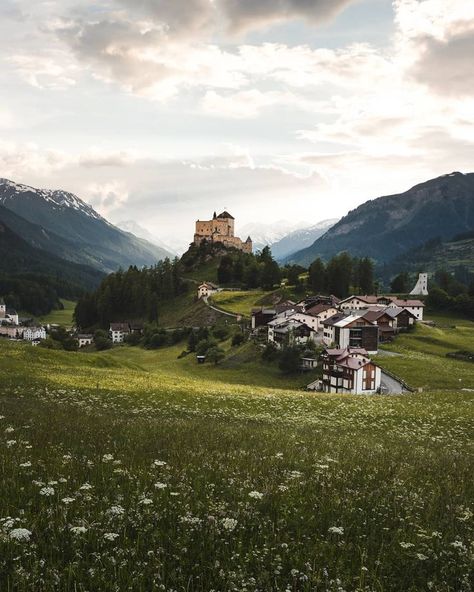 The castle on its throne 🏰 Overlooking the idyllic village of Tarasp and the beautiful blooming meadows in @engadinscuolzernez [bezahlte… Castle Medieval, England Aesthetic, Fantasy Castle, The Castle, Hiking Trip, Nature Travel, Nature Pictures, Travel Pictures, Europe Travel