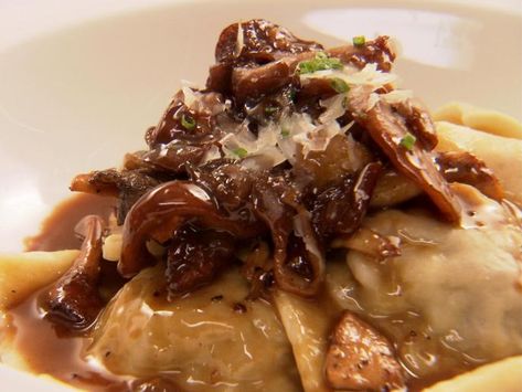 Short Rib Ravioli and Creamy Mushroom Sauce : Recipes : Cooking Channel Recipe | Chuck Hughes | Cooking Channel Unique Ravioli Filling, Short Rib Ravioli, Ravioli Recipes, Mushroom Sauce Recipe, Stuffed Pasta, Rib Meat, Ravioli Recipe, Handmade Pasta, Creamy Mushroom Sauce