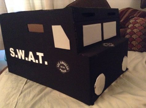 Cardboard SWAT team truck Swat Team Costume, Holiday Boards, Cardboard Car, Valentine's Ideas, Swat Team, Valentine Day Boxes, Police Box, Trunk Or Treat, Valentine Box