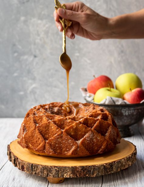 Imagine fall in a bite. This caramel apple cider bundt cake is like the cake version of apple cider doughnuts, with loads more apple flavor, and caramel. *Apple Cider Doughnut Cake Recipe on GoodieGodmother.com Caramel Apple Cider Bundt Cake, Caramel Apple Bundt Cake Recipes, Carmel Apple Cake Bundt, Apple Cider Donut Bundt Cake, Cider Bundt Cake, Apple Cider Bundt Cake, Apple Cider Doughnut Cake, Apple Cider Donut Bundt Cake Country Living, Apple Cider Doughnut