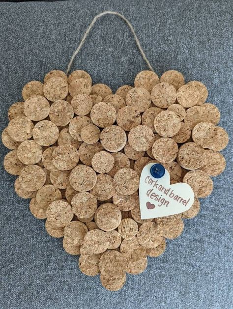 "Handmade Wine Cork Heart. This beautiful heart is made-to-order and is created with love - and lots of bottles of champagne and wine! Cheers!  A great piece to add to any wall, ready to hang up and enjoy. Works great as a bulletin board as well.  Wine Cork Heart is unique and is a great gift for any occasion. For the wine lover, the happy couple, students, family, your love or for yourself! The recycled corks are cut and mounted to a wood base. Each heart will vary slightly based on the corks used. Twine Hanger attached as well.   Heart is approximately 11\"tall x 11\"wide x 1.5\"deep. Please reach out if you are interested in any custom designs, I would love to create something special for you! Thank you so much for supporting Cork and Barrel Design. Please visit again soon!" Wine Cork Heart, Cork Heart, Wine Cork Diy Projects, Wine Cheers, Cork Diy Projects, Cork Crafts Christmas, Wine Cork Diy Crafts, Wine Cork Projects, Cork Crafts Diy