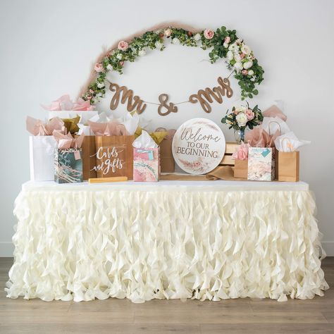 PRICES MAY VARY. 🎉🎁 Whimsical Willows: Treat your guests to Shimmery Satin and Opalescent Organza Willows. It’s the type of table party skirt that kids can’t stop touching, and that’s ok – because it’s washable! And it’s also the tutu table cloth that earns compliments and lets you know how admired you are when it comes to decorating. 💒 Timeless Elegance: This 9ft Ivory Ruffle Table Skirt is the ideal choice for sophisticated wedding decorations, classic bridal shower decorations, elegant par Sophisticated Wedding Decor, Elegant Wedding Decorations, Simple Bridal Shower Decorations, Tutu Table Skirt, Tutu Table, Ivory Table, Tulle Table Skirt, Tulle Table, Table Skirts