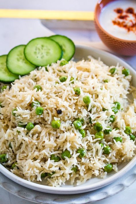 A close up shot of peas pulao made with basmati rice and whole spices. Baked Fudge Recipe, Fudge With Condensed Milk, Cucumber Raita, Pulao Recipe, Rice And Peas, Basmati Rice, Greek Salad, Indian Dishes, Garam Masala