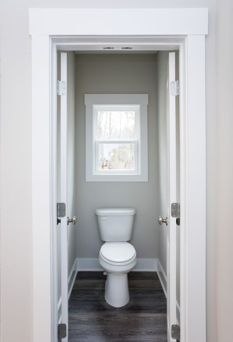 Double doors to accommodate an “in swing” door vs swinging into the Mstr Bath Solstice Housing Group Swinging Bathroom Door Ideas, Toilet Room Door, Toilet Facing Door, Bathroom Door Hits Toilet, Bifold Door For Toilet Room, Bathroom Door Swinging Out, Bathroom With Separate Toilet Room Pocket Doors, Bathroom French Doors, French Door Interior