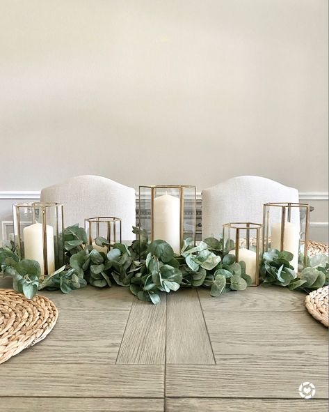 DINING ROOM | Starting to figure out my “non-seasonal” dining room decor 💁🏼‍♀️ This faux eucalyptus arrived last week before we went to Colorado, and I didn’t get a chance to post the progress for you. 🥰 I’ve had these brass candle holders on the sideboard since I got them, but knew that they’d make a cool centerpiece too! ✨ Now that the table top feels right, I’m going to get to work on that empty wall! 🙌🏼 What’s your favorite dining room focal piece?! Asking for a friend... 😜 . . ,  Shop Lantern Dining Table Decor, Dining Room Centerpiece Ideas Modern, Long Dining Table Centerpiece, Long Table Centerpieces For Home, Table For Small Kitchen, Styling Dining Table, Small Kitchen Dining Table, Table Styling Dining, Table Chairs Dining