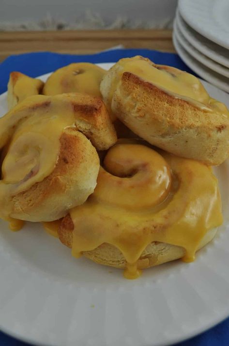 Orange cinnamon rolls baked in the air fryer. Rolls In Air Fryer, Orange Cinnamon Rolls, Air Fryer Recipes For Beginners, Orange Sweet Rolls, Pillsbury Cinnamon Rolls, Orange Icing, Cinnamon Roll Bake, Orange Rolls, Vegetarian Chicken