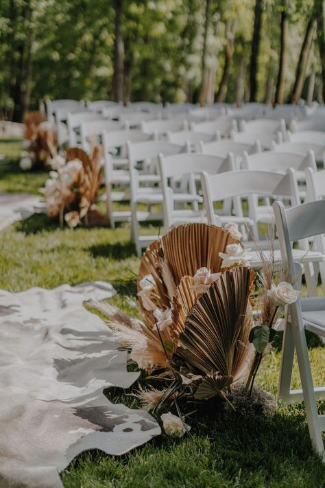 Cowhide rugs make for a cozy & on-trend wedding aisle, indoor or out. #ICYMI, check out our latest blog to get inspired by a boho-luxe event we participated in at Saddle Woods Farm. Wedding Aisle Indoor, Rug Aisle, Dried Wedding Flowers, Boho Backdrop, Reception Bar, Luxe Decor, Wedding Arches, Skin Rugs, Wedding Arbour