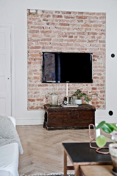 one-room Scandinavian apartment brick TV wall Apartment Entertainment Center, Decorate Tv Wall, One Room Apartment, Brick Interior, Scandinavian Apartment, Trendy Apartment, Living Room Tv Wall, The Fireplace, One Bedroom Apartment