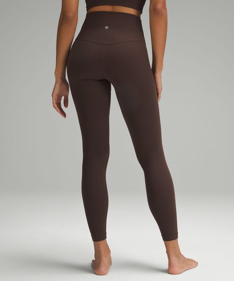 When feeling nothing is everything. The lululemon Align collection, powered by Nulu fabric, is so weightless and buttery soft, all you feel is your practice. Designed for Yoga. Full length intended to sit at ankle. Hidden waistband pocket fits a card or a key, and won't get in your way. This collection's great for low-impact workouts like yoga, or whenever you want to feel really, really comfortable. Lululemon Espresso Set, Brown Lululemon Leggings Outfit, Brown Lululemon Leggings, Lululemon Favorites, Lulu Lemon Pants, Cute Athleisure Outfits, Lulu Lemon Leggings, Lululemon Running, Lulu Leggings