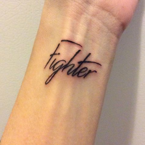 Tattoo #fighter #domesticviolencesurvivor  Small wrist tattoo Small But Mighty Tattoo, Fighter Tattoo Men, Small Wrist Tattoos For Guys, Tattoo Ideas Female Wrist, Small Wrist Tattoo, Fighter Tattoo, Small Henna Designs, Love Font