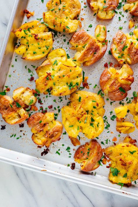 These crispy smashed potatoes are utterly irresistible! I dare you not to eat them straight from the pan. #smashedpotatoes #crispypotatoes #potatorecipe #cookieandkate Smashed Potatoes Baked, Macros Recipes, Smashed Potatoes Recipe, Crispy Smashed Potatoes, Pastas Recipes, Potato Toppings, Dish Ideas, Smashed Potatoes, How To Cook Potatoes