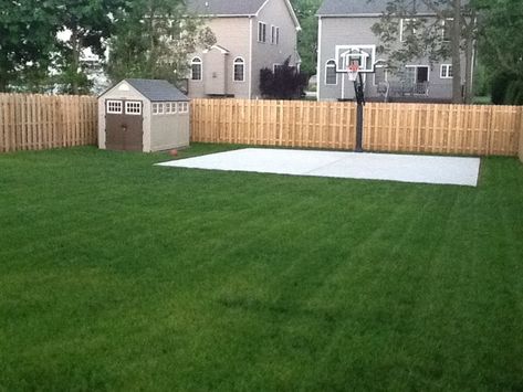 Beautiful green grass surrounds a new basketball court. Shed Basketball Court, Backyard Basketball Court Small, Basketball Backyard, Backyard Amenities, Backyard Basketball Court, Backyard Court, Home Basketball Court, Basketball Court Backyard, Backyard Sports