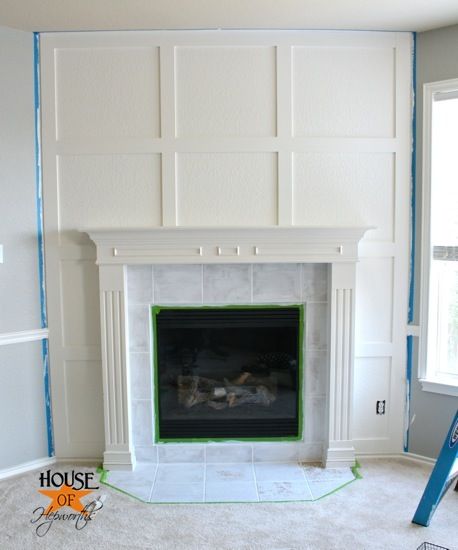 Clean millwork detail to accent fireplace to complement wainscot on either side of adjacent walls. Fireplace Makeover White, Corner Brick Fireplaces, Corner Fireplace Layout, Corner Fireplace Mantels, Dramatic Fireplace, Black Mantel, White Moulding, Fireplace Accent Walls, Outdoor Fireplace Plans