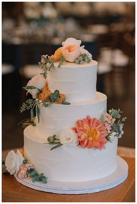 White butter cream cake with fresh orange flowers | An Elegant Estate Wedding in Cleveland #weddings #weddingcake #cake  #weddingcakes  #wedding  #weddingideas #weddinginspiration Fresh Cream Wedding Cake, Two Tier Wedding Cake With Flowers, Unique Wedding Cakes Elegant Romantic, Butter Wedding Cake, Wedding Cake With Orange Flowers, Wedding Cake Orange Flowers, Cake With Orange Flowers, Wedding Cake Orange, Butter Cream Wedding Cake