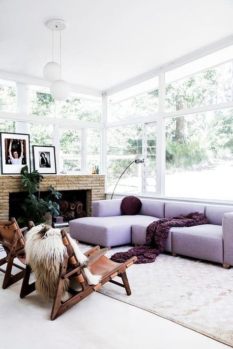 This lilac sofa makes a dramatic style statement in this light and airy home. It’s used on the sofa only and not anywhere else in the room, so the sofa becomes the focal point and the scheme avoids being overly feminine. image credit:    Homes To Love AU Stylish Living Room, Livingroom Layout, Open Plan Living, Decorating On A Budget, Small Living Rooms, Small Living Room, Eclectic Decor, Small Living, Colorful Interiors