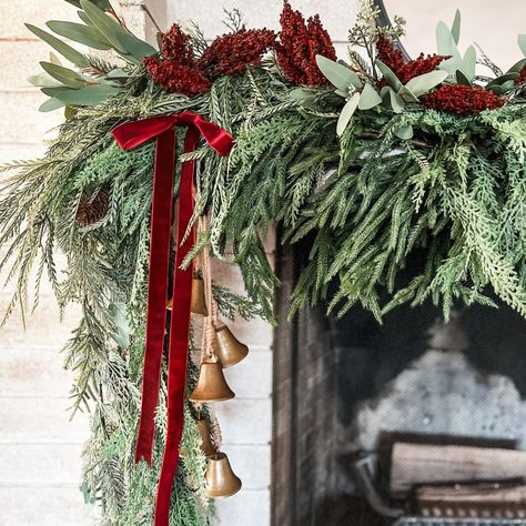 28 Christmas Garland Ideas for Stunning Holiday Decor – Staircase, Mantle and More! - placeideal.com Christmas Tree With Cranberry Garland, Elegant Christmas Garland Ideas, Diy Doorway Garland Christmas, Classy Christmas Wreath, Red Ribbon Christmas Decor, Wedding Christmas Decorations, Cranberry Garland Diy, Cranberry Christmas Decor, Doorway Garland Christmas