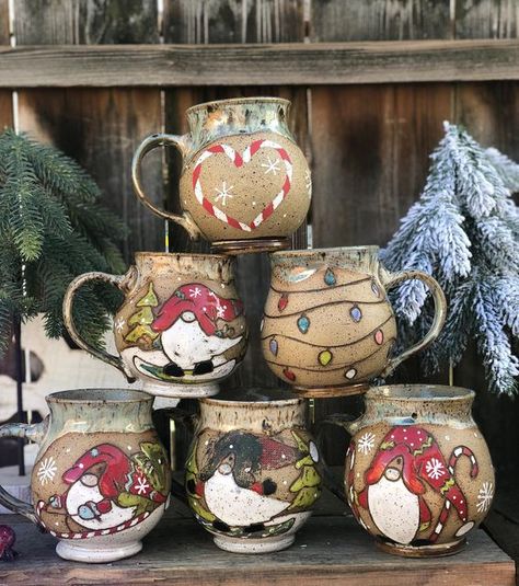 Jodie Rae on Instagram: "Mugger Load Restock is happening this Small Business Saturday, Nov 26th at 12:00pm, Eastern Time. Sign up for my newsletter to get the details. 😘 #gnomes #gnomepottery #potterygnomes #ceramicgnomes #gnomesofinstagram #holidaygnome #christmas #holidaymugs #howimayco #maycoglaze #maycocolors #diamondcore #skutt #brentcxc #underglaze #loveceramics #fortheloveofclay" Gnome Mug, Pottery Ornaments, Small Business Saturday, Ceramic Studio, Pottery Designs, Ceramic Artists, Ceramic Cups, Christmas Mugs, Ceramic Art