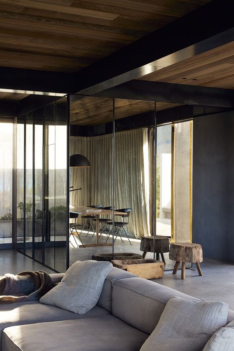 Te Pakeke in New Zealand is hidden by black shutters and a concrete wall Mirrored Doors, Black Shutters, Secluded Cabin, Architectural Details, Home Ceiling, Story House, Concrete Wall, Local Design, Australian Design