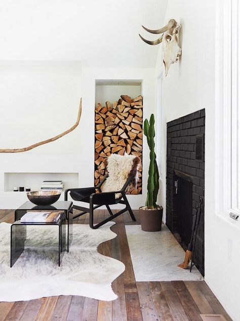 5 Brilliant Ways to Style Cowhide Rugs - Thou Swell Scandinavian Fireplace, Scandinavian Design Living Room, Black Fireplace, Living Room Scandinavian, Scandinavian Interior Design, Scandinavian Furniture, Decoration Inspiration, Stunning Interiors, A Living Room