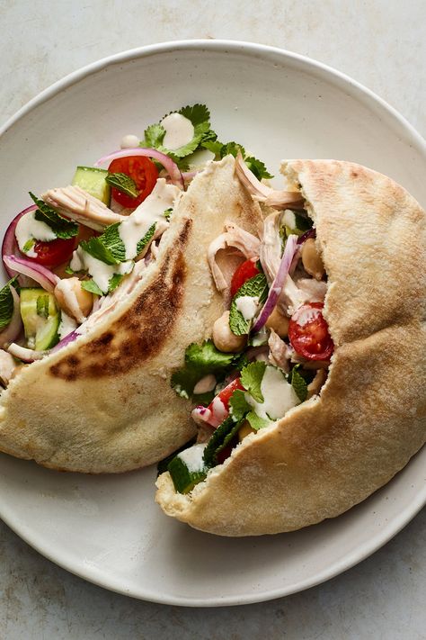 Turkey Pitas With Cucumbers, Chickpeas and Tahini Recipe - NYT Cooking Turkey Pita, Stuffed Pita, Chile Recipe, Pulled Turkey, Tomato And Onion Salad, Pita Recipes, Tahini Recipe, Sausage Gumbo, Pomegranate Salad