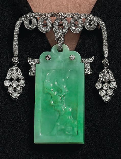 CARTIER | An Art Deco jade and diamond brooch, circa 1920. Jade Brooch, Orientalist Art, Bijoux Art Deco, Egyptian Revival Jewelry, Deco Dress, Dress Clips, Art Deco Dress, Art Deco Jewellery, Art Deco Brooch