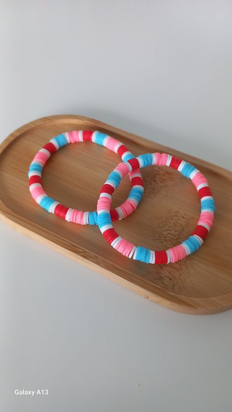 1pc light blue, neon pink ,red and white clay beads. not recommended for very young children due to choking hazard. Simple Clay Bead Bracelet Ideas, Braclets Ideas Clay Beads Easy, Neon Clay Bead Bracelets, Braclets Ideas Beaded Aesthetic, Clay Bead Inspo, Cute Clay Bead Bracelet Ideas, Bracelet Buisness, Clay Beads Ideas, Bracelets Clay Beads