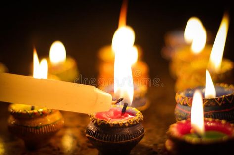 Earthen diya lamp lighting with candles on the occasion of diwali and sandhi puj , #Sponsored, #lamp, #lighting, #Earthen, #diya, #candles #ad Diya Lamp, Lamp Lighting, Wedding Vector, Diwali, Vector Logo, Birthday Candles, Stock Images, Candles, Lighting