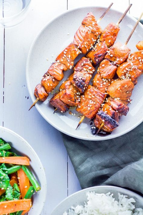 Our SWEET and STICKY salmon skewers are marinated in maple soy to create a TASTY dish. Enjoy these cooked on the BBQ or under the oven grill. #lowFODMAP #glutenfree #dairyfree #dinner #salmon #skewers