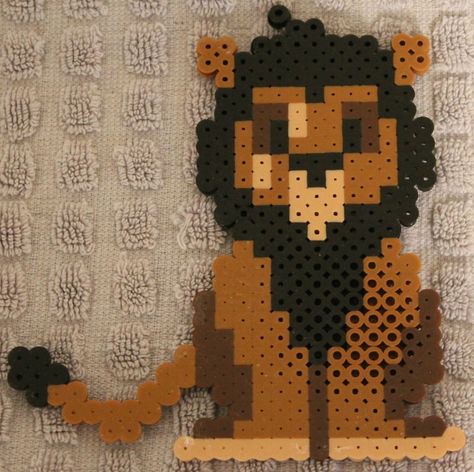 Made this since Scar is one of my favorite baddies of all time. I may make the other characters from The Lion King as well. For sale in my Storenvy shop as well as with my other bead sprites. ... Hama Beads Disney, Melty Bead Patterns, Fuse Bead Patterns, Hama Beads Design, Fusion Beads, 8bit Art, Perler Bead Templates, Hama Bead, Perler Crafts