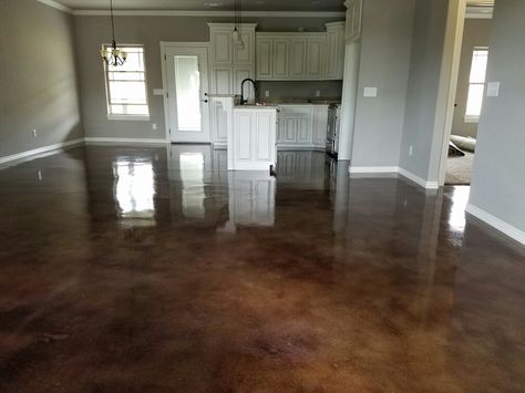 Chocolate Brown Stained Concrete Floor. If you want floors this rich looking give Russ a CALL at Premier Concrete Designs,LLC 479-387-7895 to discuss transforming your home! Dark Brown Concrete Floors, Brown Stained Concrete Floors, Concrete Flooring In House, Brown Concrete Floor, Stained Cement Floors, Saddle Room, Concrete Floors Bedroom, Coastal Farmhouse Exterior, Stained Concrete Floor