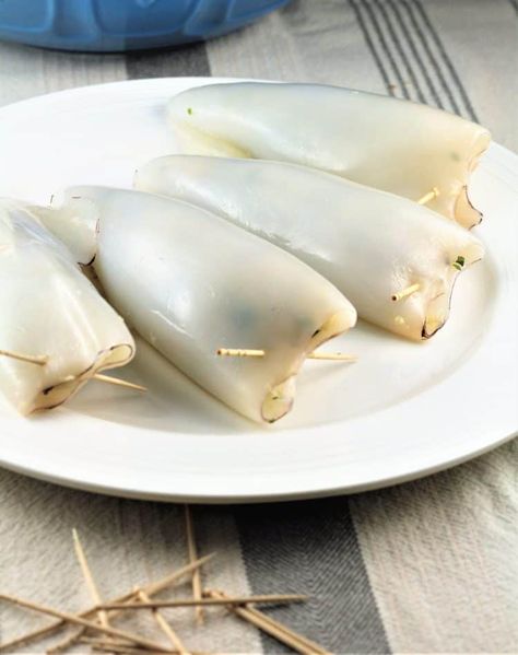 stuffed calamari tubes on white plate with toothpicks to secure the ends Stuffed Calamari Tubes Recipe, Make Ahead Stuffing, Stuffed Calamari, Sicilian Food, Calamari Recipes, Marinara Recipe, Fresh Bread Crumbs, Dry Bread, Sicilian Recipes