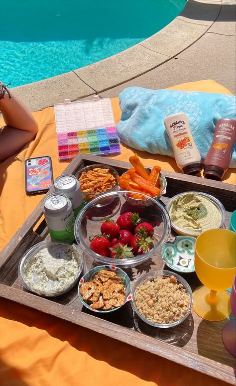 This pin shows a poolside picnic tray. There are strawberries, bell peppers, pretzels and other spreads. The picture has a lot of orange and blue tones. Beach Trip Food, Friendship Vacation, Tanning Beach, Hawaiian Tropic, Pool Day, Coconut Girl, Summer Swim, Crafts Jewelry, Pool Days