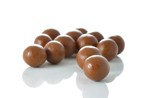 Maltesers are simply malted milk balls coated in chocolate. On the U.S. side of the pond, they are known as Whoppers. While there are some subtle differences between the two, they are essentially the same sweet candy. Whether you call them Maltesers or Whoppers, you can make them at home with three ... Malt Balls Recipe, Malted Milk Balls Recipe, Whoppers Candy, Maltesers Chocolate, Maltese Recipes, Malted Milk Balls, Chocolate Covered Pretzel Rods, Chocolate Balls, Candy Truffles