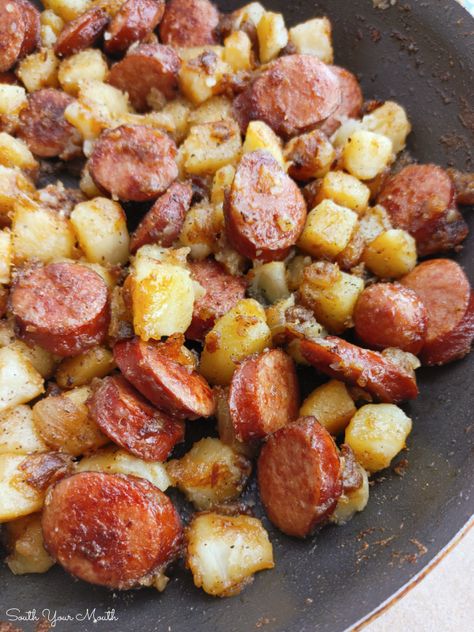 Southern Fried Potatoes & Sausage! A simple budget-friendly recipe for a one-pan skillet meal with smoked sausage, onions and southern-style fried potatoes. South Your Mouth Recipes, Southern Fried Potatoes, Smoked Sausage And Potato Recipe, South Recipes, South Your Mouth, Sausage And Potatoes, Sausage Recipes For Dinner, Cheeseburger Pie, Smoked Sausage Recipes