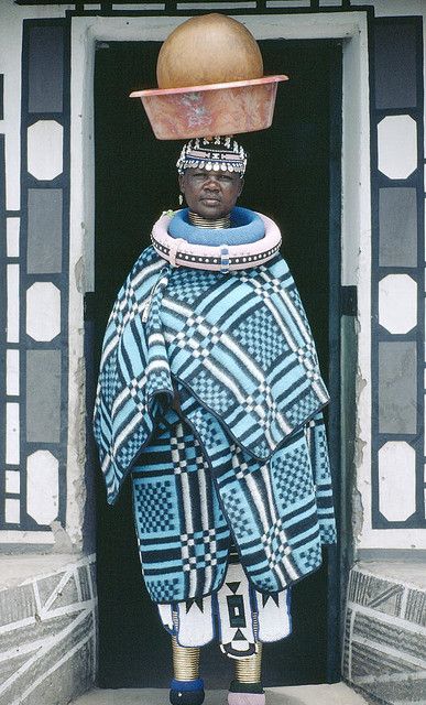 Africa |  People.  A woman from the Ndebele tribe in South Africa carries a traditional beer container. Tribe Fashion, Afrikaanse Mode, Photo P, African People, Out Of Africa, We Are The World, African Culture, World Cultures, People Of The World