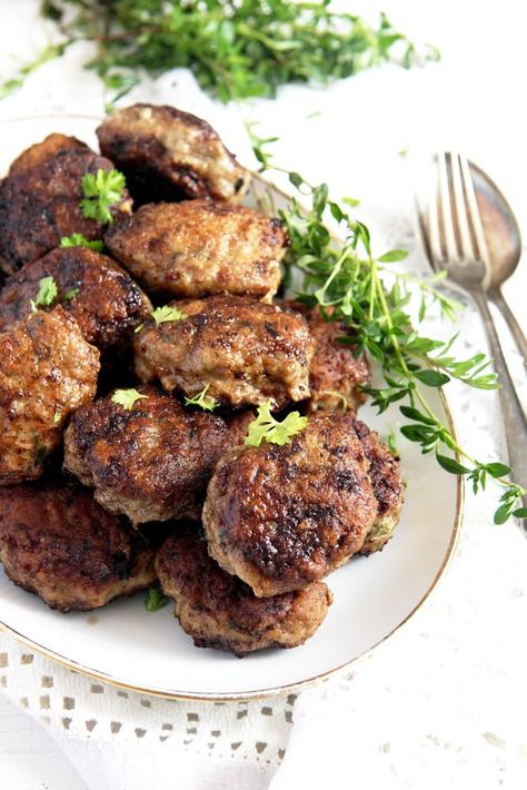 Romanian meatballs, also known as chiftele or parjoale: juicy, garlicky, full of herbs and flavor. Grandma-style pork and beef meatballs, these are one of the most popular Romanian dishes. #whereismyspoon #romanianmeatballs #romanianchiftele #meatballsrecipe #chiftelerecipe #romanianfood #romanianrecipes #beefandporkmeatballs Romanian Meatballs, Pork And Beef Meatballs, Romanian Dishes, Beef And Pork Meatballs, Romania Food, Grandma Style, Pork Meatballs, Mince Recipes, Serbian Recipes