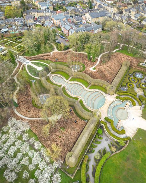 Aerial drone captures of the stunning @alnwickgarden Grand Cascade and Rose Garden, so mesmerising from this Birds Eye view you can really appreciate the pattern and symmetry of the design. The gorgeous cherry blossom may have taken centre stage these last few weeks but the rest of the gardens are so pretty to discover too. I love a wander around the different sections here and each season brings a different aspect with new plants and flowers in bloom. (Drone footage taken with permission... Garden Design Aerial View, Flowers In Bloom, Drone Footage, Aerial Drone, Centre Stage, Plants And Flowers, Birds Eye View, I Love A, Blooming Flowers