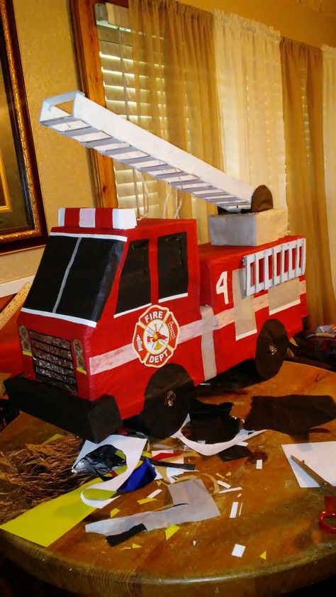 Fire Truck Piñata  # Firetruck Pinata Diy, Firefighter Pinata, Firetruck Piñata, Fire Truck Pinata, Cardboard Fire Truck, Diy Fire Truck, Truck Cake Ideas, Cake Truck, Fire Truck Cake