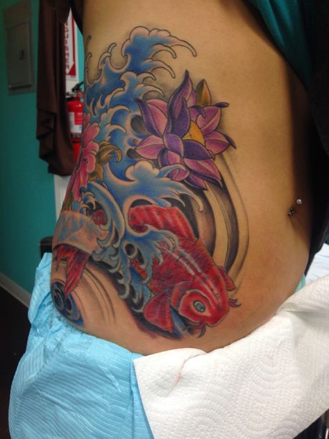 Tattoo stomach koi fish color  Chris Burnett evangel ink Hesperia ca water Side Waist Tattoos Women, Tattoo Stomach, Koi Fish Colors, Chinese Fish, Fish Color, Stomach Tattoos Women, Stomach Tattoo, Waist Tattoos, Stomach Tattoos