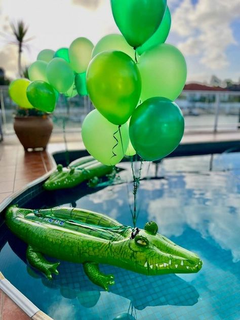 Jungle theme party with fun decorations | CatchMyParty.com Jungle Disco, Jungle Theme Party, Jungle Boogie, Jungle Theme Parties, Fun Decorations, New Year's Party, Jungle Party, Pool Decor, Safari Birthday