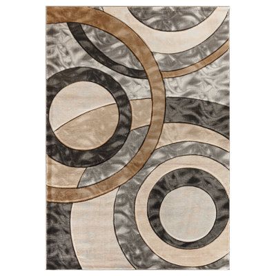 This area rug features 100% heat-set polypropylene with hand-carved accents to give it depth and character in contemporary designs. | Wrought Studio™ Adonia Abstract Brown/Gray/Black Area Rug Polypropylene in White, Size 24.0 W in | Wayfair Circle Geometry, Abstract Geometric Pattern, Soft Carpet, Black Area Rugs, Geometric Area Rug, Grey And Beige, Contemporary Area Rugs, Rug Collection, Indoor Area Rugs