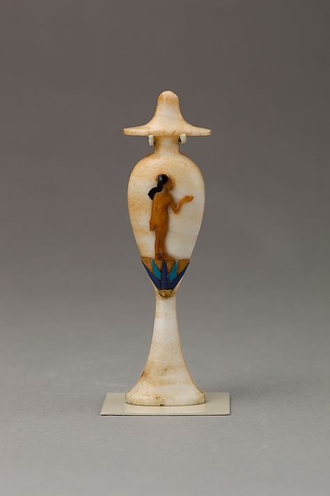 Perfume bottle in the shape of a hes-vase inlaid with the figure of a princess  Period: New Kingdom, Amarna Period Dynasty: Dynasty 18 Reign: reign of Akhenaten Date: ca. 1353–1336 B.C. Geography: Egypt Medium: Calcite, carnelian, obsidian, and colored glass inlay Egyptian Inspired, Egyptian Artifacts, Egyptian History, Ancient Egyptian Art, Antique Perfume, Ancient Symbols, Egyptian Art, Ancient Artifacts, A Princess