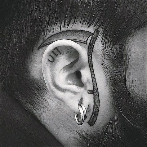 Man With Tattoo Of Scythe Around Ear On Face Mens Face Tattoos, Small Face Tattoos, Face Tats, Unusual Tattoo, Bauch Tattoos, Face Tattoos, Home Tattoo, Head Tattoos, Small Tattoo Designs