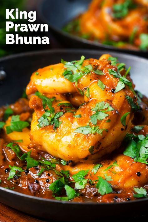 King prawn bhuna, a gloriously spicy Indian curry featuring succulent jumbo shrimp cooked in a rich thick sauce made of tomatoes & onions. Indian Prawn Curry Recipes, Mexican Prawns Recipe, Cooked Prawn Recipes, Indian Prawn Curry, King Prawn Recipes, Indian Shrimp, King Prawn Curry, Spicy Indian Curry, Indian Prawn Recipes