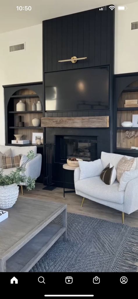 Black Fireplace Room Ideas, Tv On Black Fireplace, Black Arched Built Ins Fireplace, Black Fireplace Grey Floor, Black And Grey Fireplace, Black Statement Fireplace, Black Fireplace With Shelves On Side, Dark Shiplap Wall Living Room, Black Brick Fireplace With Built Ins