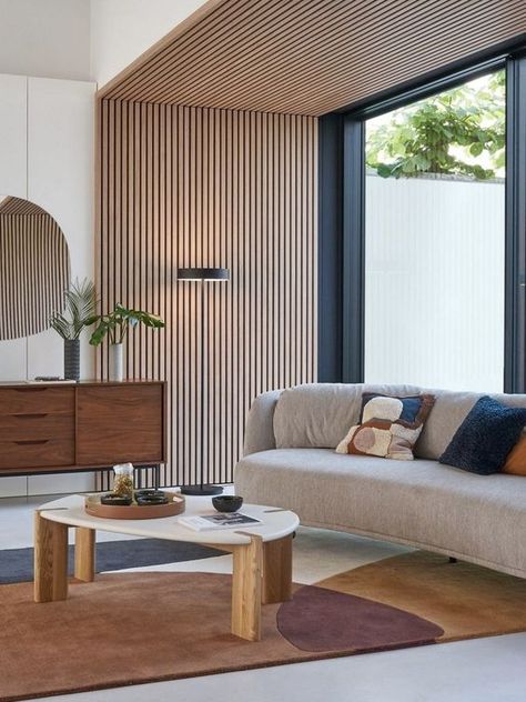 an elegant mid century modern living room with a wood slat accent wall and ceiling, a curved sofa, a printed rug, a stained credenza and a coffee tabl Wood Slat Wall, Set Sofa, Mid Century Modern Living, Mid Century Modern Living Room, Interior Wall Design, Hus Inspiration, Drawing Room, Home Room Design, Wall Panel